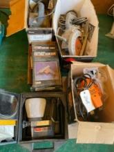 Lot of power tools. Glue gun, Skilsaw, plunge router , belt sander, etc