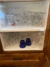 Large lot of assorted glasses. Wine glasses, goblets, etc