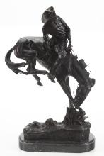 Bronze Western Sculpture titled "The Bronc Buster", marked "Frederick Remington". Bronze measures 24