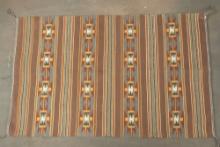 Unique Navajo Weaving with unique colors and great graphic design. Very fine condition, measures 47