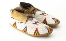 Pair of contemporary leather & fully beaded Moccasins. THE LATE DEAN FLOCK ESTATE,WYOMING.
