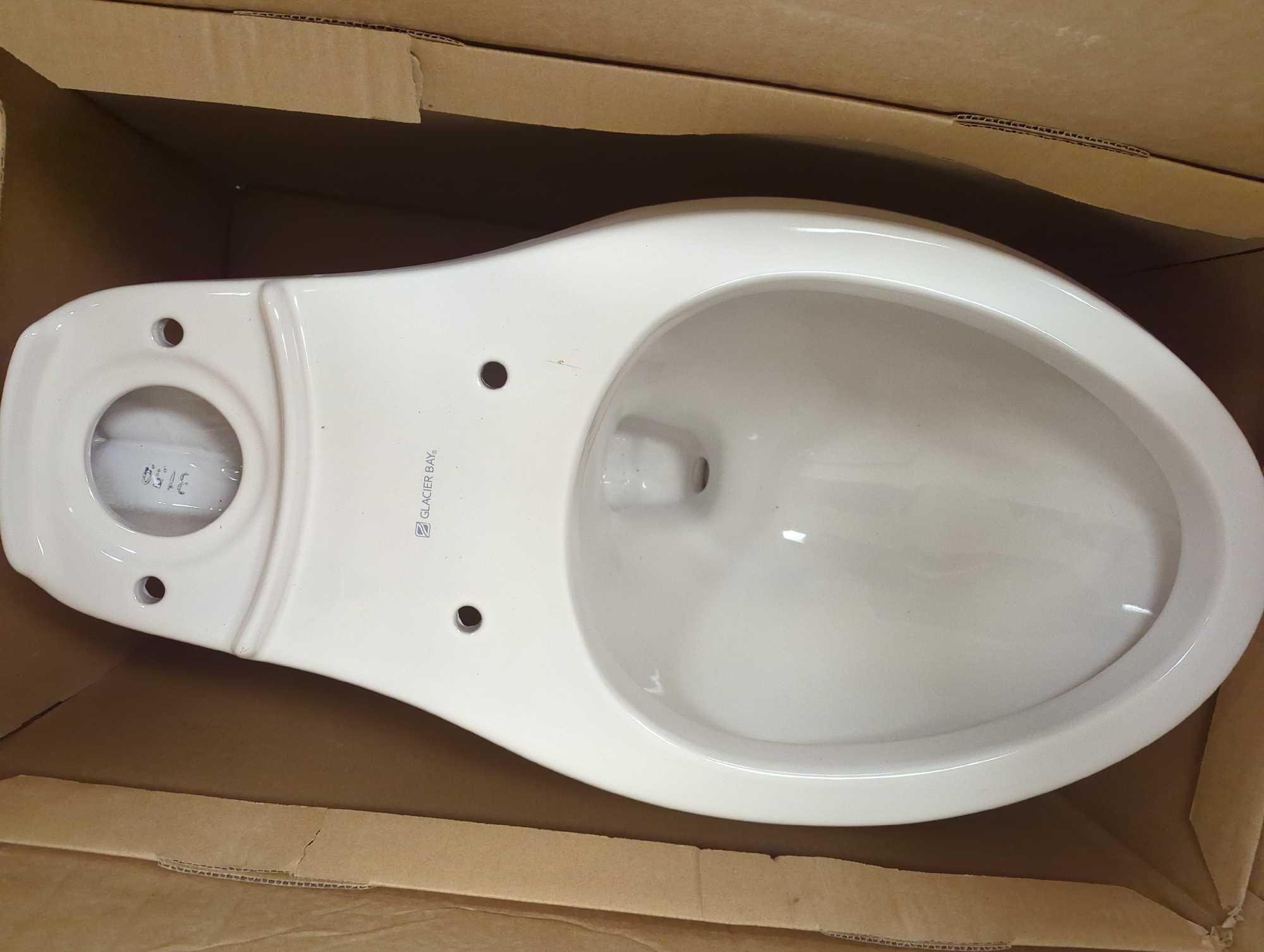 Glacier Bay 2-piece 1.1 GPF/1.6 GPF High Efficiency Dual Flush Complete Elongated Toilet in White,