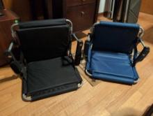 (BR2) LOT OF (2) FOLDING PORTABLE STADIUM/CAMPING CHAIRS. ONE IS COX BRAND IN BLACK & THE OTHER IS