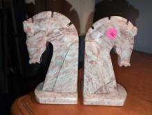 (DBR1) PAIR OF MCM CARVED PINK ROSALIA MARBLE TROJAN HORSE HEAD BOOKENDS. THEY MEASURE 3"W X 4"D X