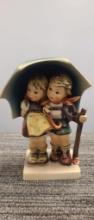 M.I. HUMMEL FIGURINE "STORMY WEATHER"