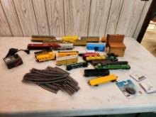 Group of Model Trains & Tracks