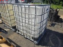 275 GALLON TOTE TANK W/ CAGE BULK TANK