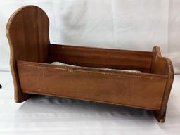 VINTAGE WOODEN DOLL ROCKING CRADLE SOME CRAYON SCRIBBLES. 20"X12"X14" PICK UP ONLY