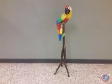 A parrot on a wooden stand