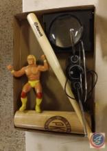 Mini baseball bats, Hulk Hogan figure, magnifier, and TV rabbit ears