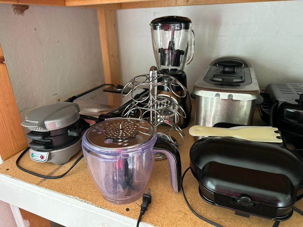 Shelf Lot of Counter Top Kitchen Appliances and Plastic Ware