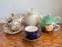 Group of Tea Pots and Tea Cups