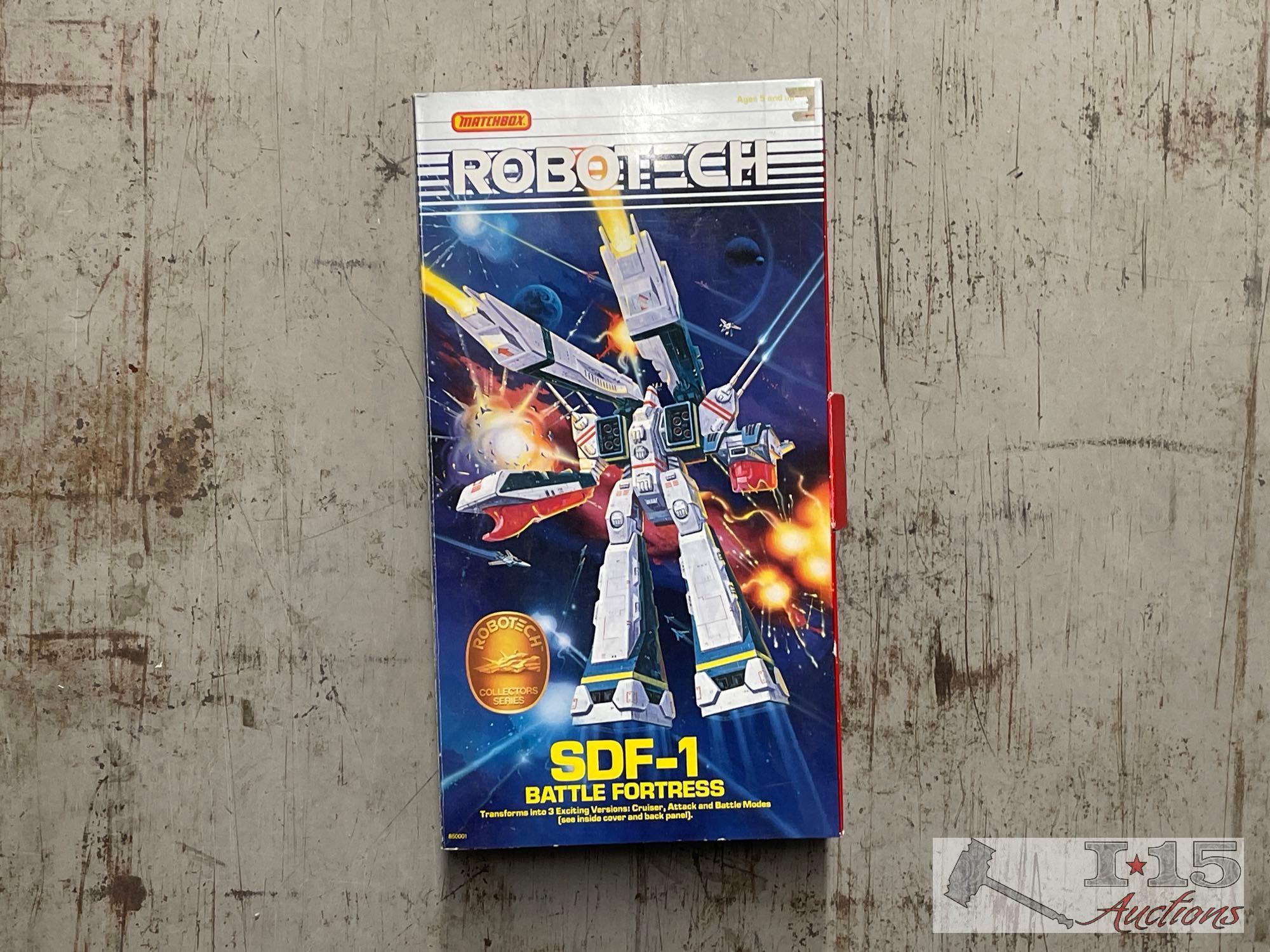 Robotech Figurines and Empty Boxes