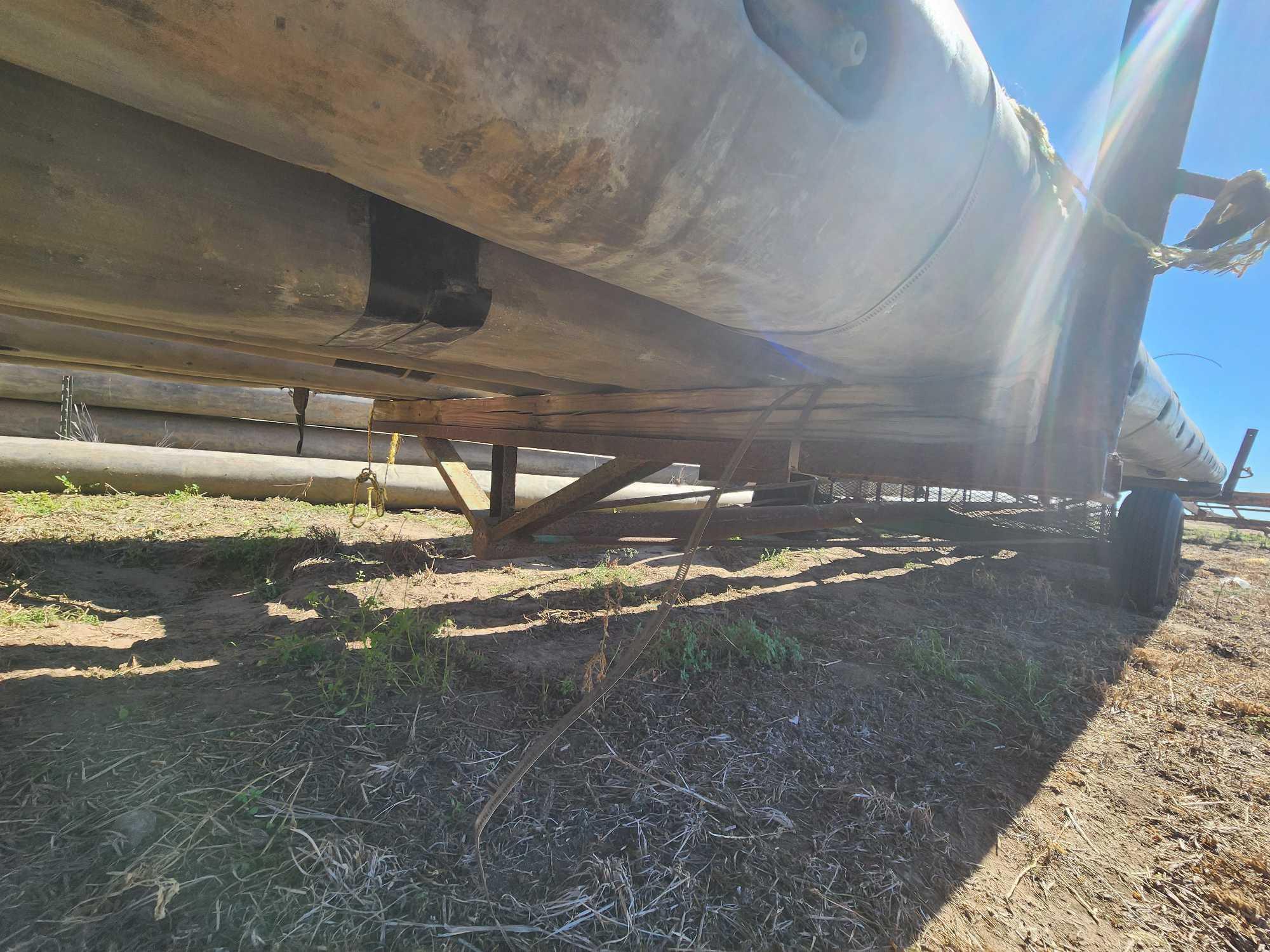 Group of Aluminum Irrigation Pipes on Flat-Bed 19'x8'5" Trailer19FT X 8FT 5IN.