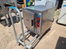 (1) Comm. Stainless/S Rolling Cart and (1) Vulcan Stainless/S Commercial Steamer