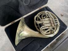 (1) Trombone w/ Carry Case, (1) French Horn w/ Carry Case