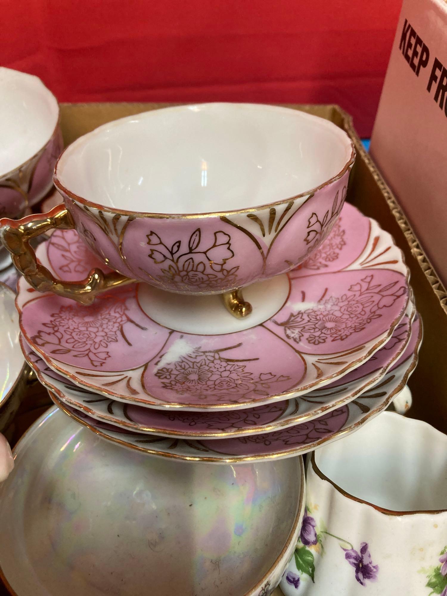 Vintage China, including cups and saucers, plates, and more