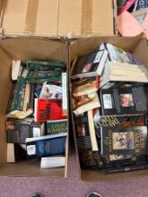 two boxes of paperback books