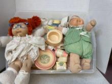 Four Cabbage Patch dolls With accessories