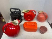 red orange pottery, pitchers, fish. Fiesta Halls etc