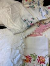 large quantity of linens, tablecloths pillowcases napkins vintage