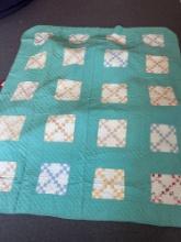 grouping of antique handmade quilts