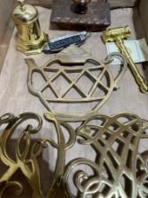 brass trivet and miscellaneous brass pieces, two pocket knives, teacup, and more