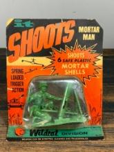 1960's WWII Motor Man Shooting Toy in Package.