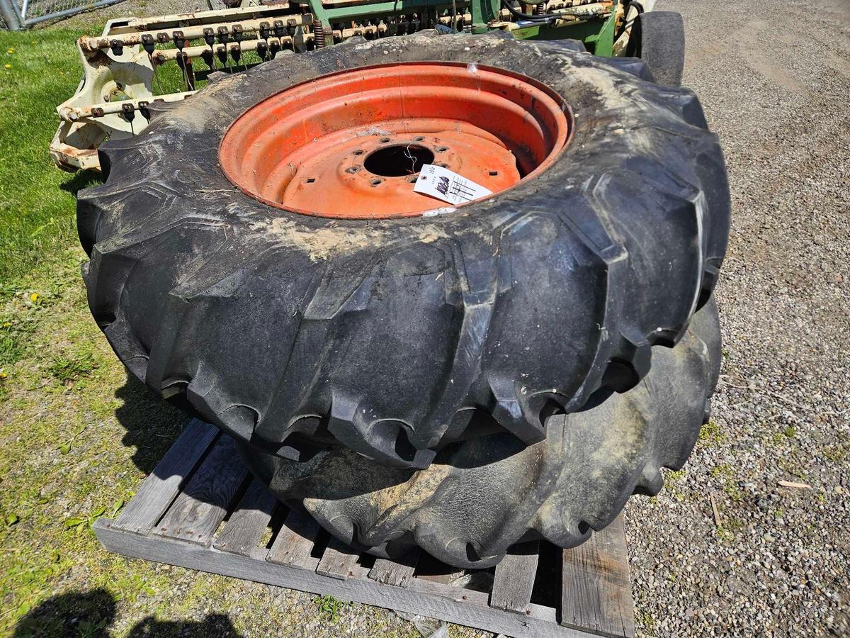 Pair of mounted 14.9 x 26 tractor tires
