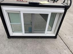 Small energy wall window in carrying case