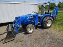 New Holland TC30 diesel loader tractor with backhoe