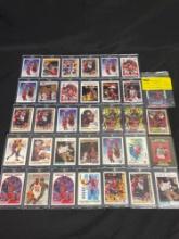 Michael Jordan Cards grouping in magnetic holders, includes RC reprint (fake)