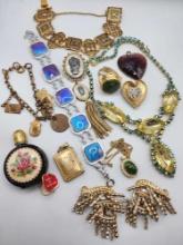 Costume jewelry lot: locket, rhinestones, butterfly wing, perfume