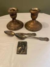 Weighted Sterling candlesticks, 2 Sterling spoons, possible sterling buckle