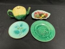 Majolica pottery teapot, plates, leaf dish