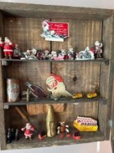 assorted Coca-Cola collectibles and miniatures.