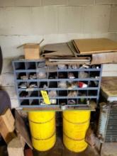 Metal parts bin with assorted hardware and 2 metal barrels