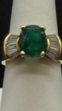 Exquisite 14k Gold Center Emerald with Side Diamond baguettes ring