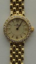 Fine Ladies Baum & Mercier 14k Gold and Diamond Watch