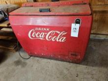 Early reach in CocaCola cooler