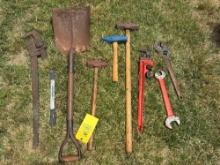 tools; pipe wrench, crowbar, flat shovel, sledge hammers
