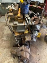 tool cart, transmission, truck hitches, wood, wire spool