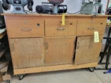 5ft Long work bench on casters with cabinet contents