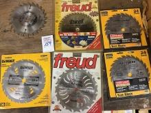 (5) new 7-7 1/4 saw blades and (1) used Freud / dewalt