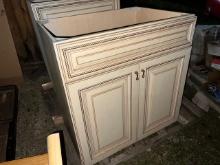 (2) vanity cabinets