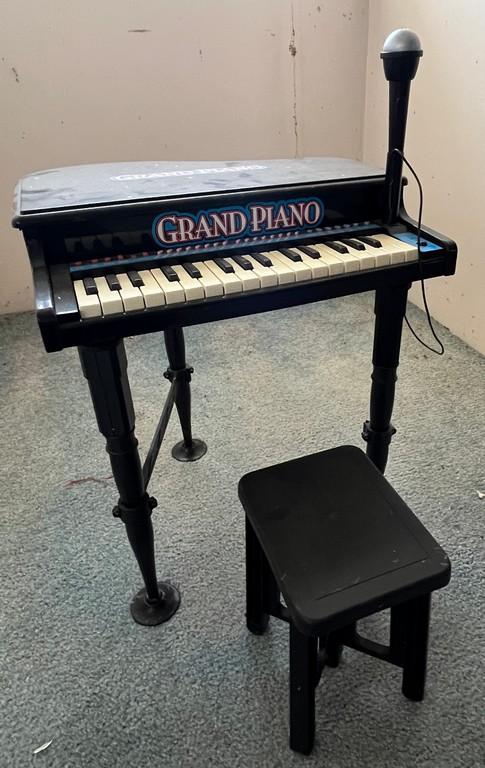 Toy Grand Piano with a Microphone and Stool