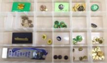 Collection of Girl Scout Pins in Organizer